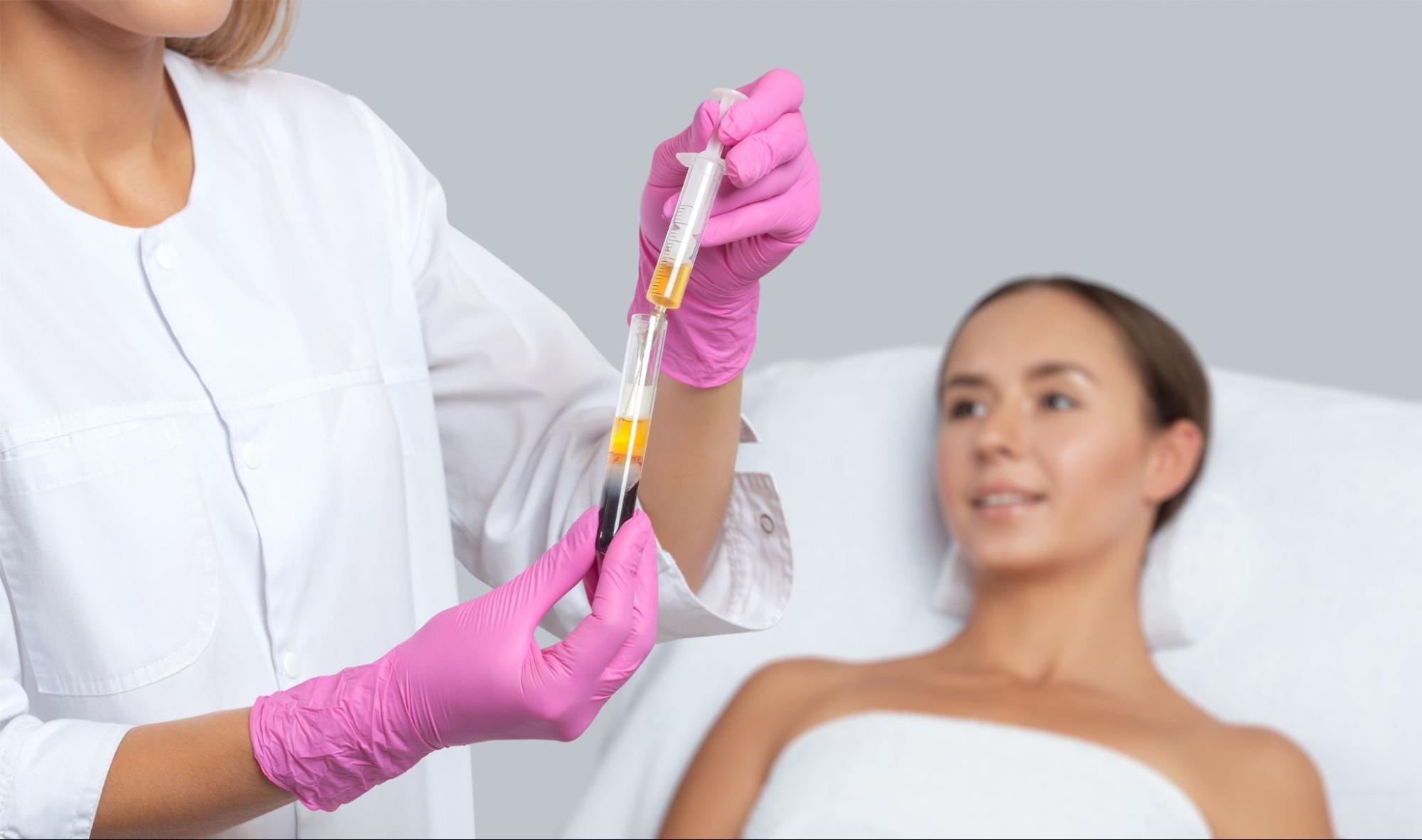 Doctor performing PRP therapy injection for hair loss treatment and follicle regeneration.